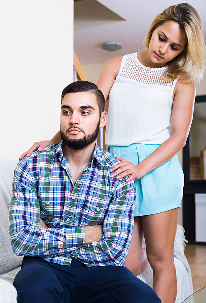 istock adult asking offended partner for forgiveness at home 492939952