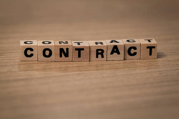 istock Contract in wooden cubes 492945228