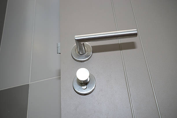 istock silver knob and gray door 492945402