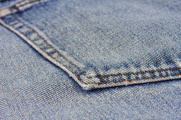istock jean texture clothing fashion background. 492946256
