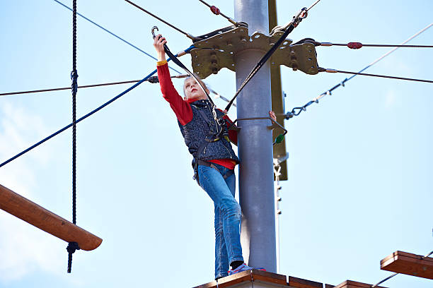 istock Girl is climbing to amusement park 492946618