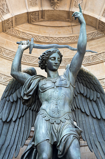 Statues of Fountain Saint Michel in Paris . France