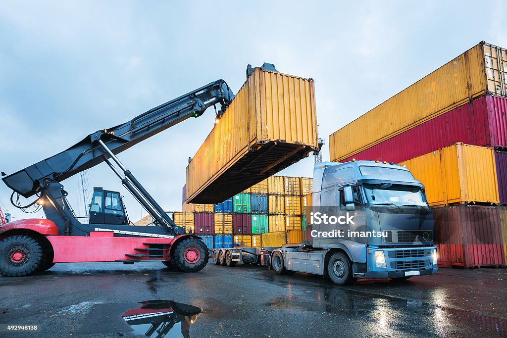 Cargo container transshipment Cargo containers stored in transhipment station Container Stock Photo