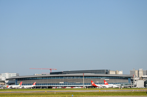 Zurich, Switzerland - July 15, 2015: Main Building at Zurich Airport. Zurich Kloten Airport is the largest international airport of Switzerland and the principal hub of Swiss International Air Lines. 