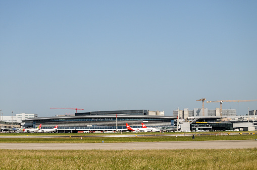 Zurich, Switzerland - July 15, 2015: Main Building at Zurich Airport. Zurich Kloten Airport is the largest international airport of Switzerland and the principal hub of Swiss International Air Lines. 