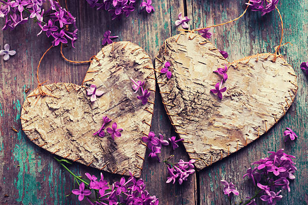 istock Background with  lilac flowers ,  decorative heart and tag 492957750