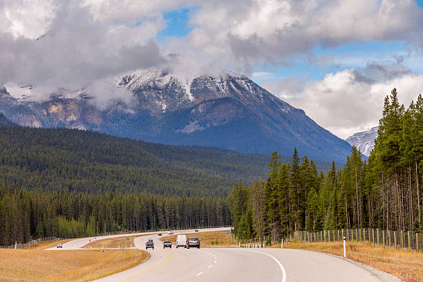 istock Road through the mountains in Canada Rockies 492958864