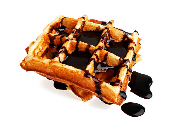 istock Freshly baked belgium waffles with chocolate on white background 492960776