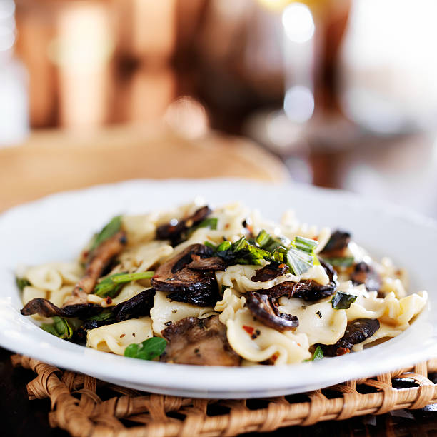 istock bow tie pasta with mushrooms and basil 492961346