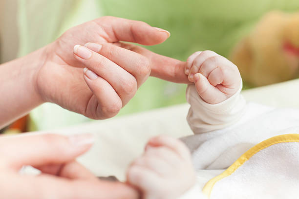 istock Newborn Baby hand 492962131