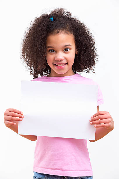 istock Young Girl Holding Blank Sign On White Background 492962299
