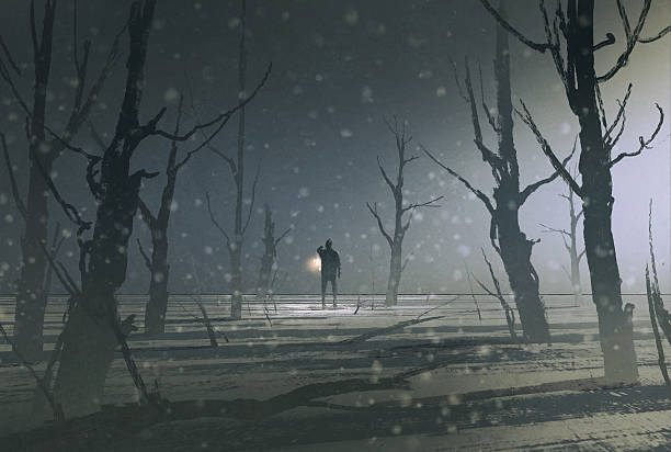 istock man holding lantern stands in dark forest with fog 492963060