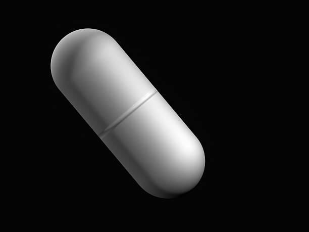 istock medicine in rendering in black background 492963568