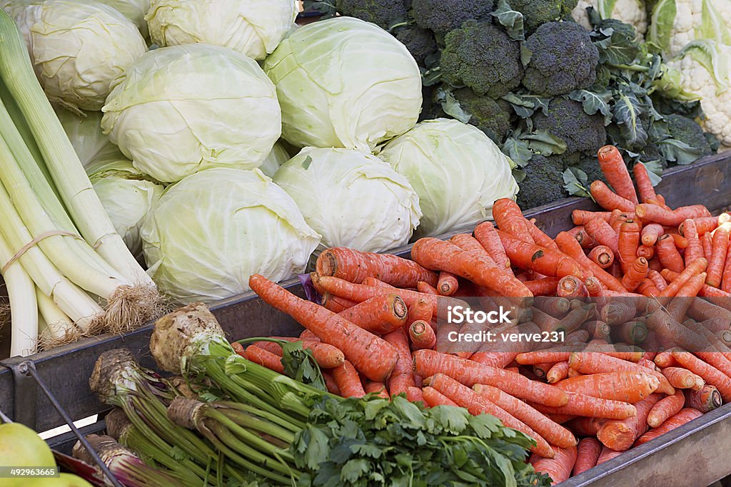 Street market with various colorful fresh vegetables Basket Stock Photo