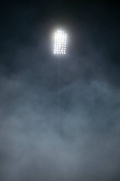 istock Stadium lights against dark night sky backgroundon 492963793