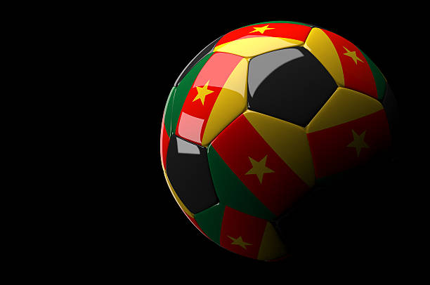 istock Cameroon soccer ball on dark background 492967209