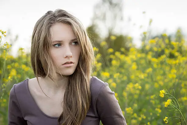 Photo of Young beautiful girl outdoor portrait, expressive look