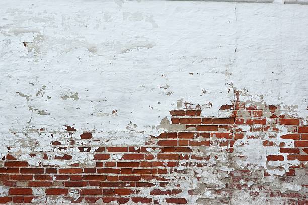 istock Old Vinyage Red Brick Wall With Sprinkled White Plaster Texture 492970378