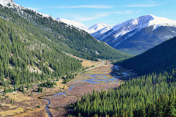 istock overlook of the snow covered mountains 492970662