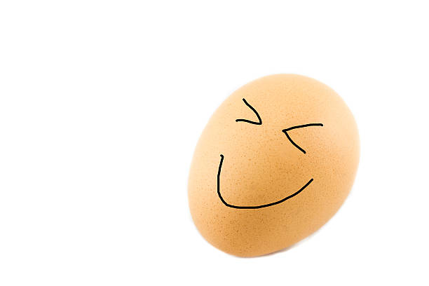 istock one brown egg with happy face on white background 492981166