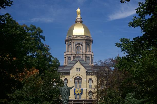 University of Notre Dame Main Building (The Golden Dome) The University of Notre Dame's Golden Dome (the Main Building) on a beautiful fall Game Day before a football game. south bend stock pictures, royalty-free photos & images