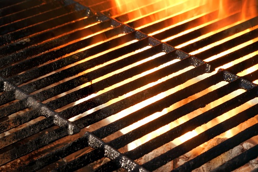 Hot Empty Flaming BBQ Grill Background Texture. Cookout Concept