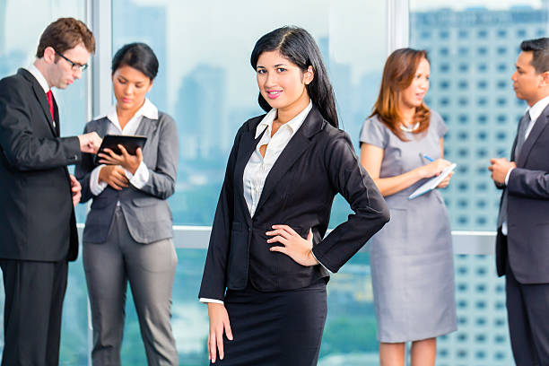 istock Asian Businesspeople having meeting in office 492983586