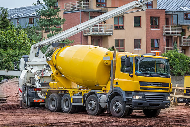 istock Concrete mixer truck in construction site 492984060