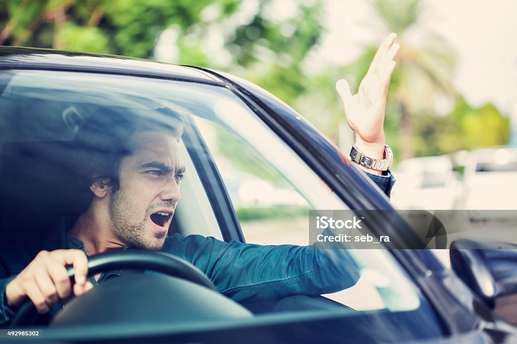 Man fight in traffic Driving Stock Photo