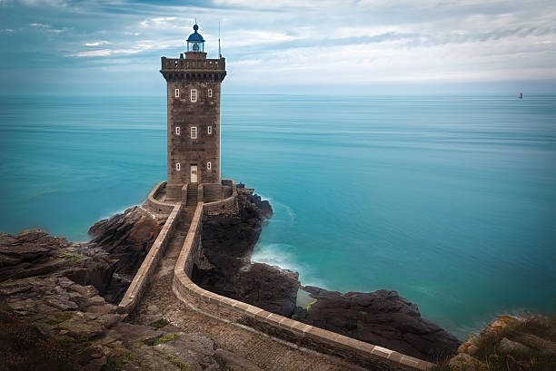 Lighthouse at Atlantic coast, Brittany, France Lighthouse at Atlantic coast, Brittany, France brest brittany stock pictures, royalty-free photos & images