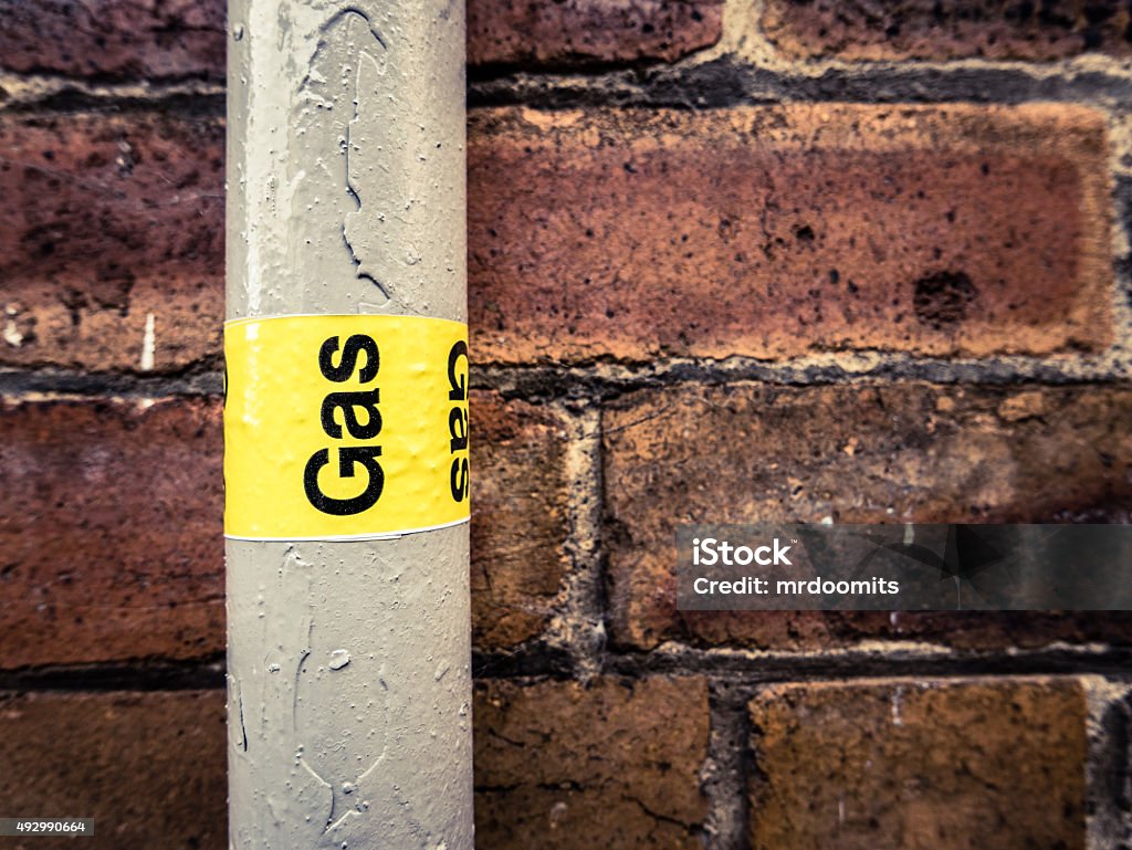 Gas Pipe Detail Of A Residential Gas Pipe Against A Red Brick Wall Natural Gas Stock Photo