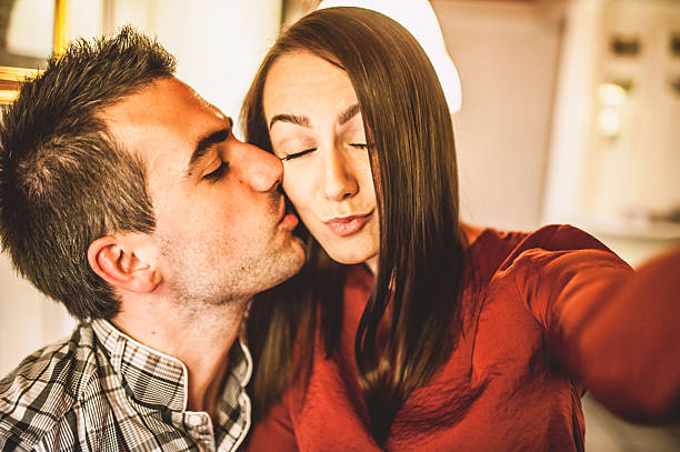 istock Young Couple Taking Selfies 492991112