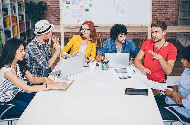 istock Creative young business people meeting. 492991740