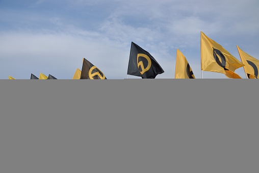 Nickelsdorf, Austria – October 17, 2015: activists of the identitarian movement Austria block the access-road to the border from Hungary to Austria at Nickelsdorf.