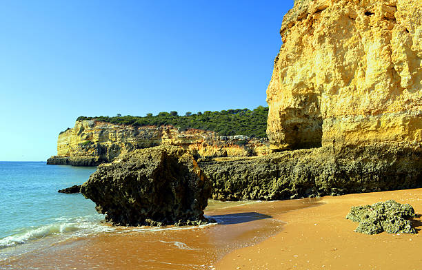 istock Spectacular cliffs on Senhora Da Rocha Nova Beach in Portugal 492995044