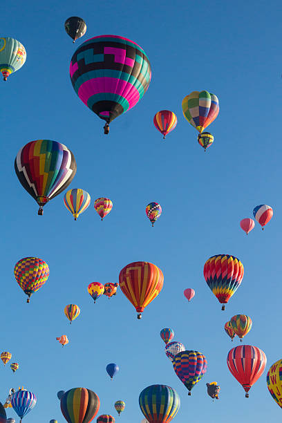 Hot air balloon in front of mountain range