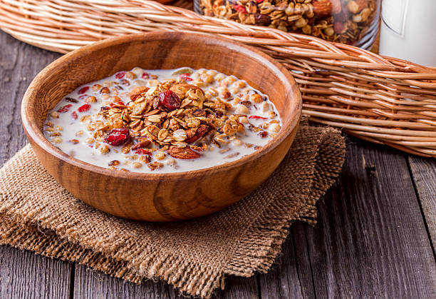 istock Homemade granola with milk, berries, seeds and nuts 493019958