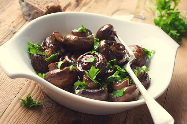 istock Baked champignons mushrooms 493022584