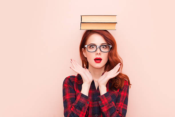 istock girl with books 493023942