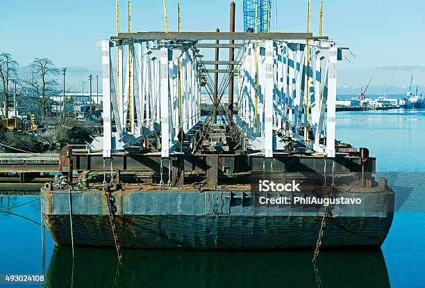 Bridge Parts On Barge In Tacoma Wa Stock Photo - Download Image Now - 2015, Anchored, Barge