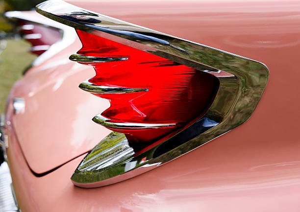 istock XXXL: Back lit tail light of an old classic car. 493026742