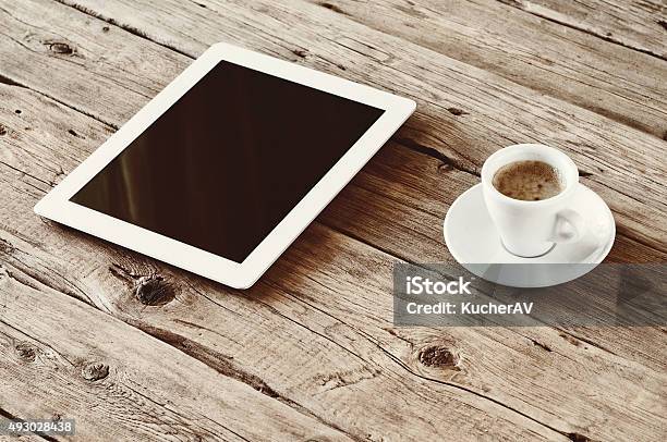 White Tablet Computer With Cup Coffe Stock Photo - Download Image Now - 2015, Arranging, Business