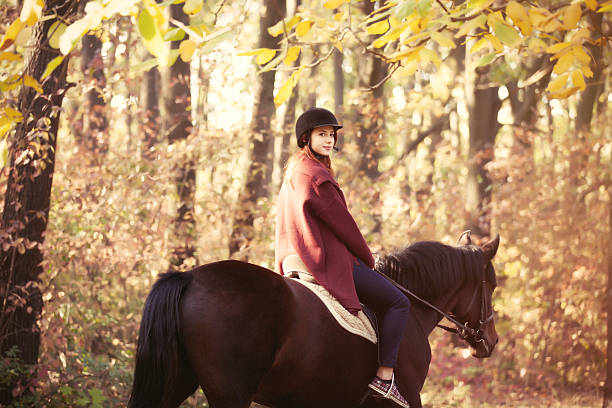 istock Young woman and horse 493028520
