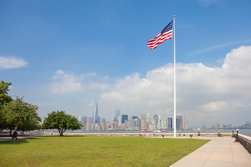 New York, Usa - June 13, 2014: New York panorama, One World Trade Center (formerly known as the Freedom Tower) and Ellis Island. Freedom Tower is shown finished with antenna.