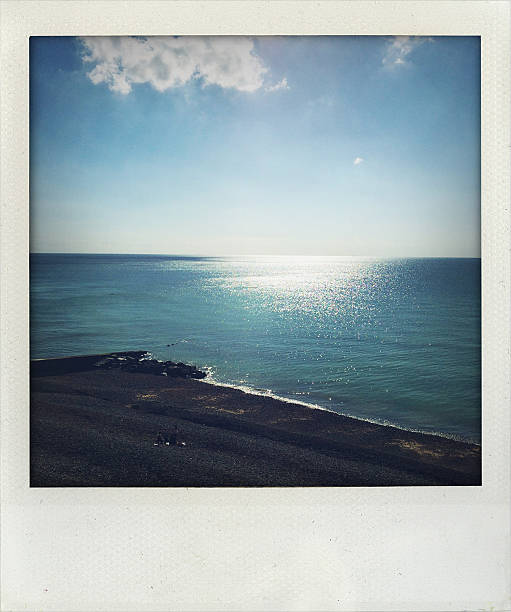 istock Family on Beach on sunny day. Polaroid image. 493054182