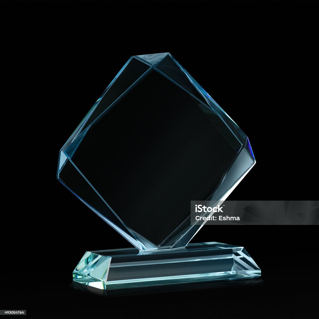 Crystal blank for award on black Crystal blank for award isolated on a black background with a clipping path Trophy - Award Stock Photo