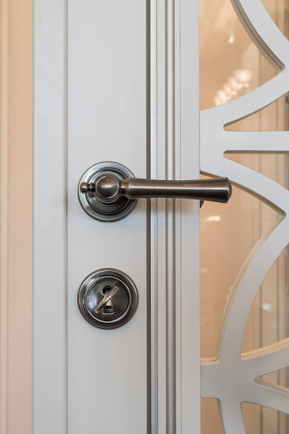 istock Knob on white wooden door 493055542