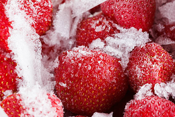 istock Strawberries, frozen for long duration storage of ice. 493055654