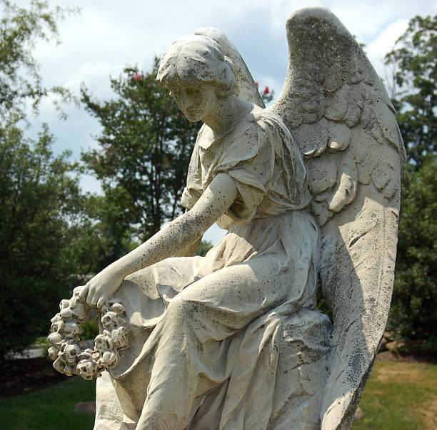 istock Cemetery Angel with Wreath 493056810