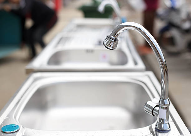 istock water tap on stainless steel kitchen sink 493058452